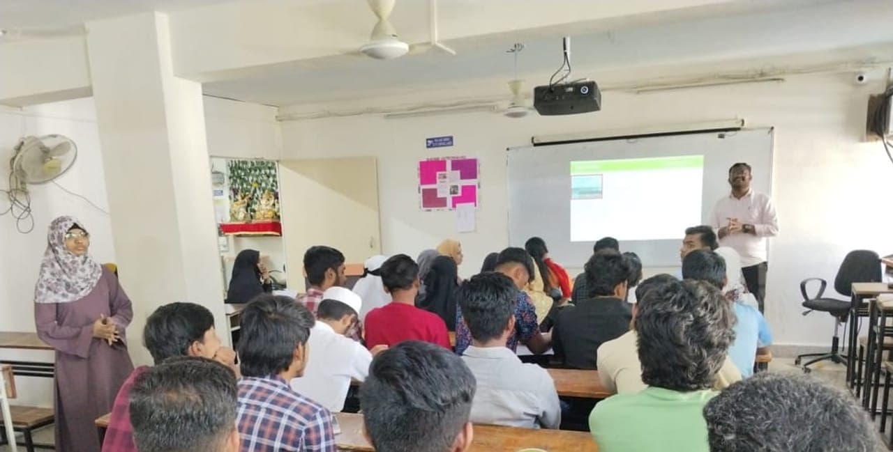 A projector-equipped FCC classroom during a workshop